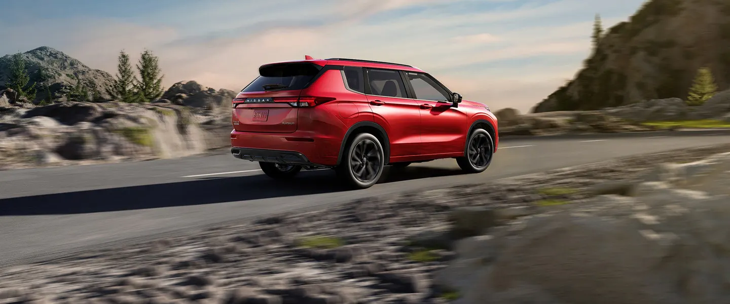 Nissan Rogue Plug-in Hybrid driving on a mountain road